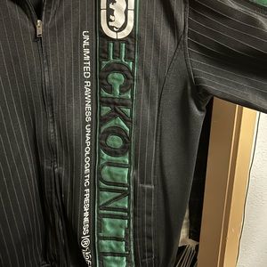 green zip up